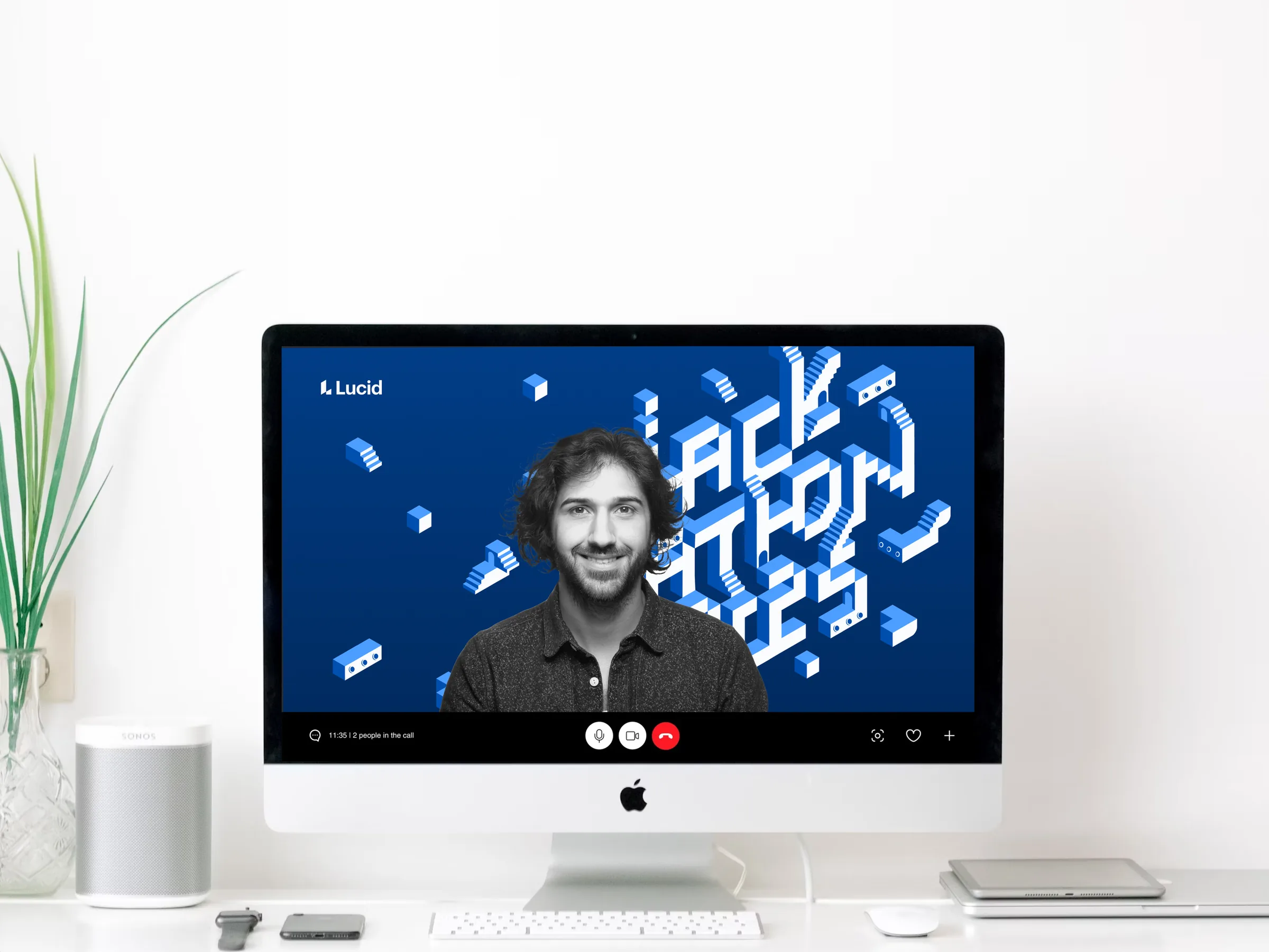 A video call with the Hackathon background behind the speaker