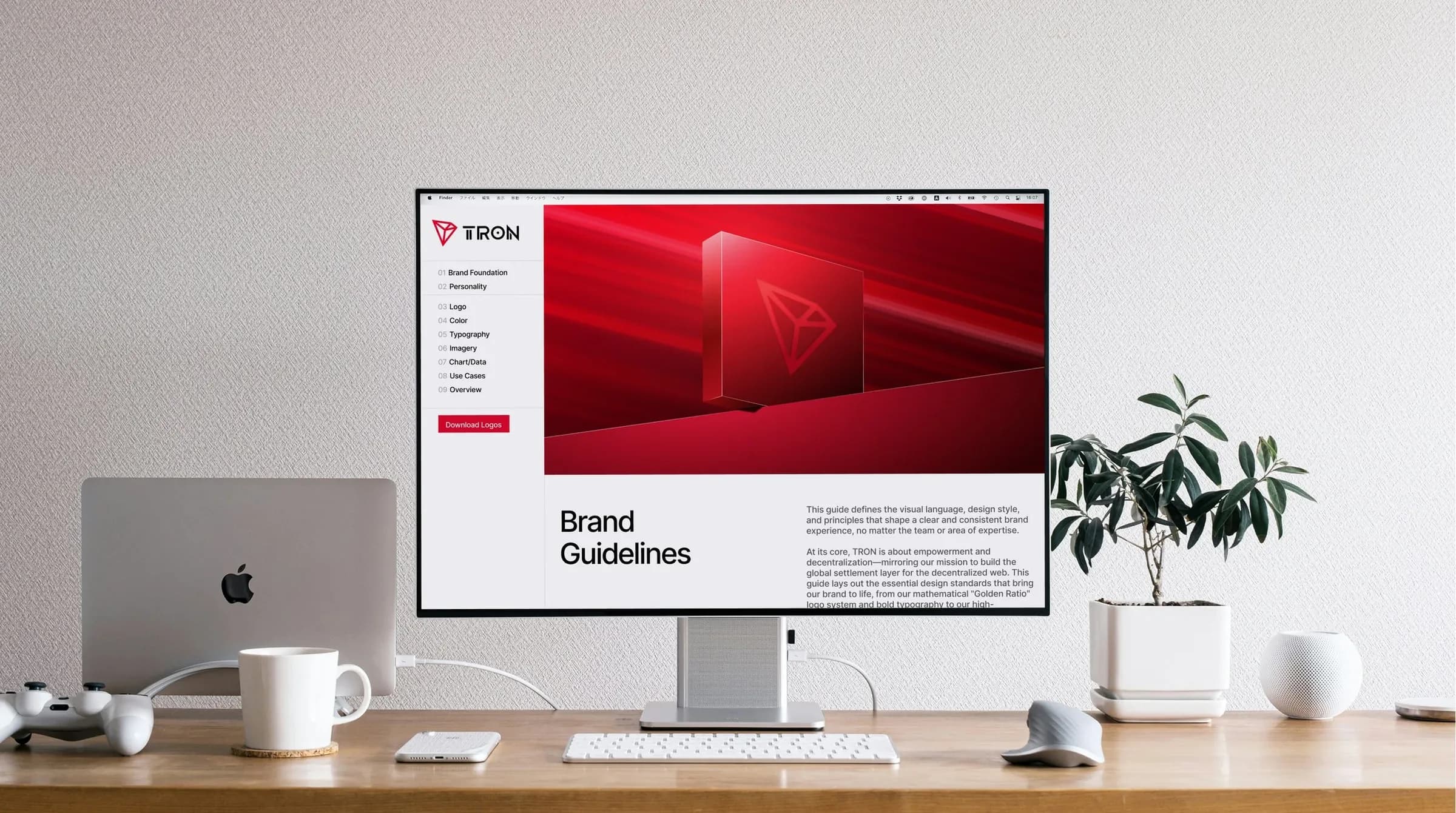 The TRON DAO brand guidelines site on a desktop monitor